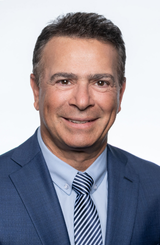 Profile Picture of Dr. Mohsen Sohi in blue suit and a tie.