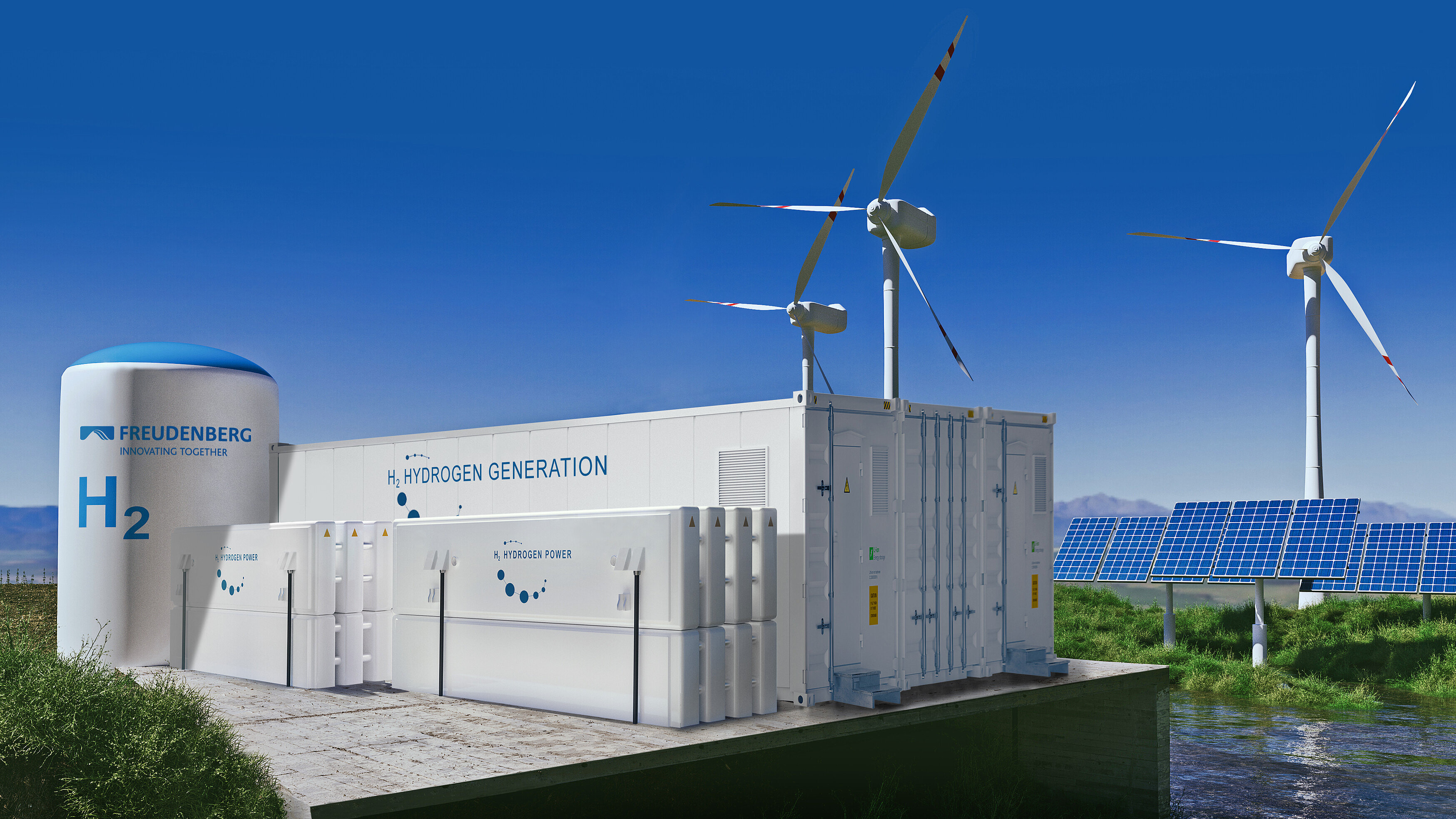 An industrial plant with wind turbines in the background