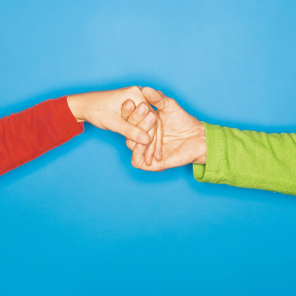 Discover family ties at Freudenberg Photo of two hands holding each other