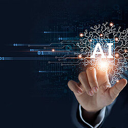 a hand touching a virtual AI sign